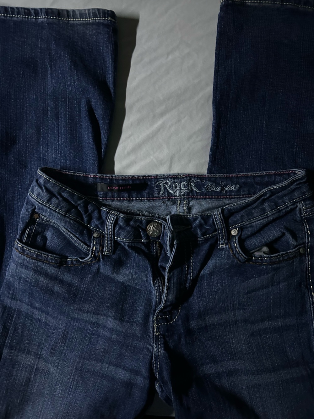 Rock Wrangler low rise bootcut jeans with leopard print back pockets